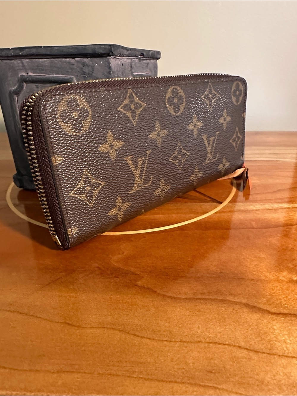 Authentic Louis Vuitton Insolite Wallet Monogram in Orange.